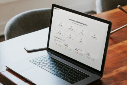 Mockup of Lone Wolf Foundation on a laptop, sitting on a desk